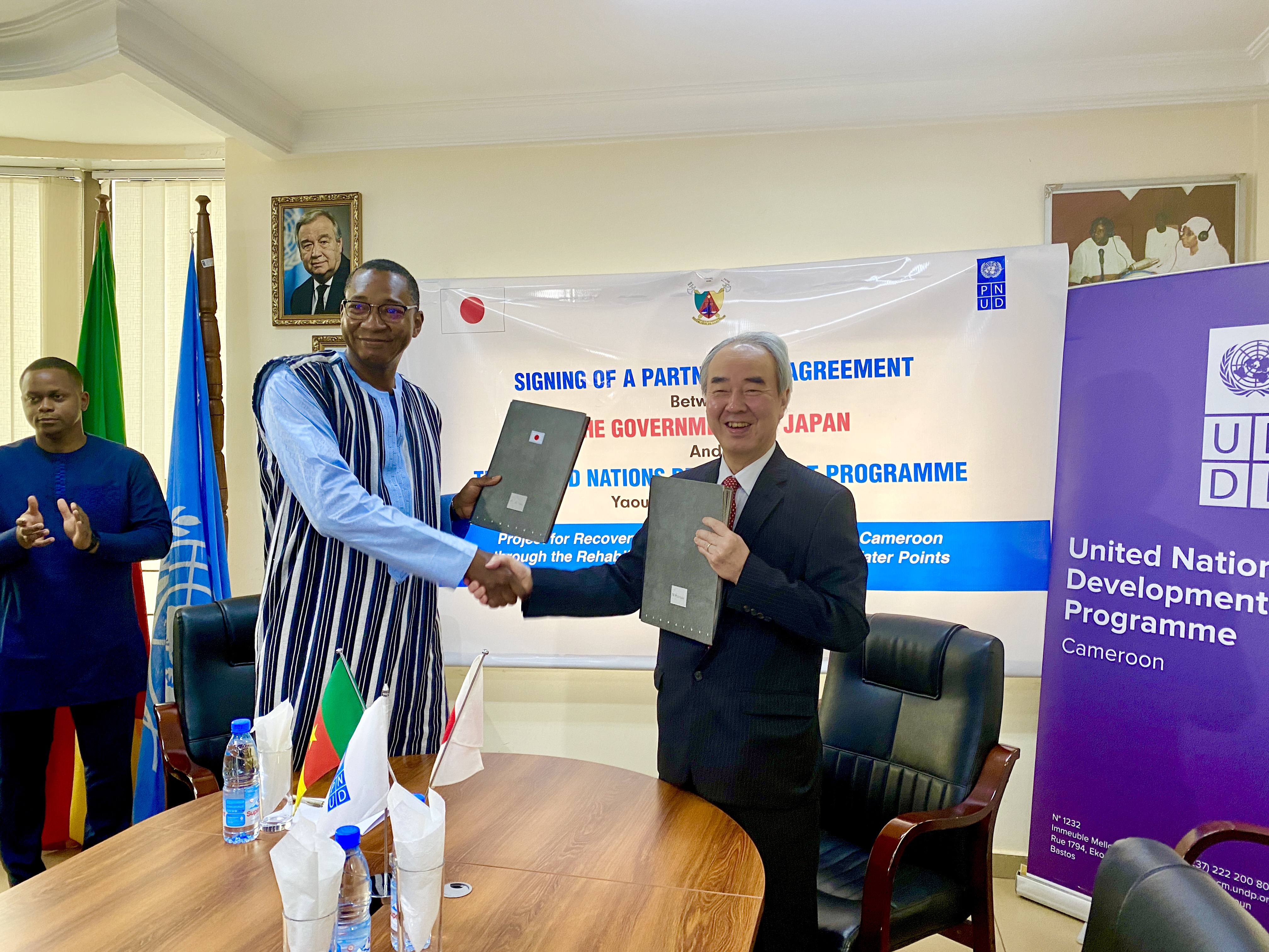 UNDP-CMR-The representatives of UNDP and the Government of Japan exchange a handshake for a fruitful partnership-2023