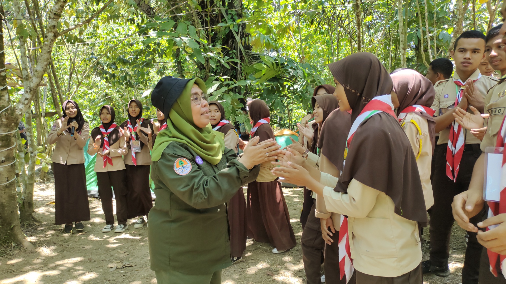 Anis with the young scouts of the Saka Wanabakti Scout movement