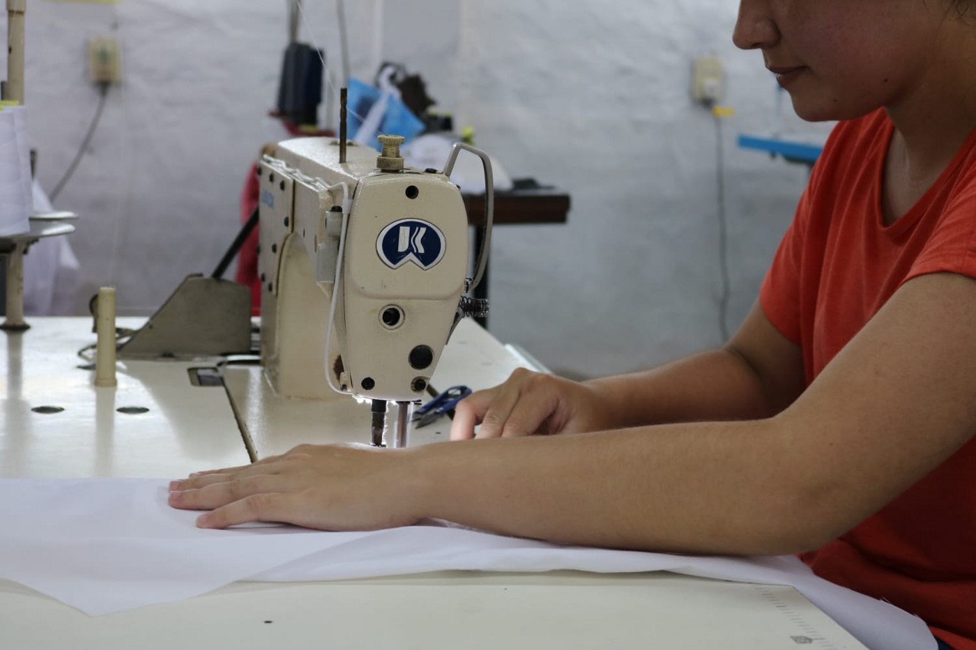 Woman working with a sewing machine