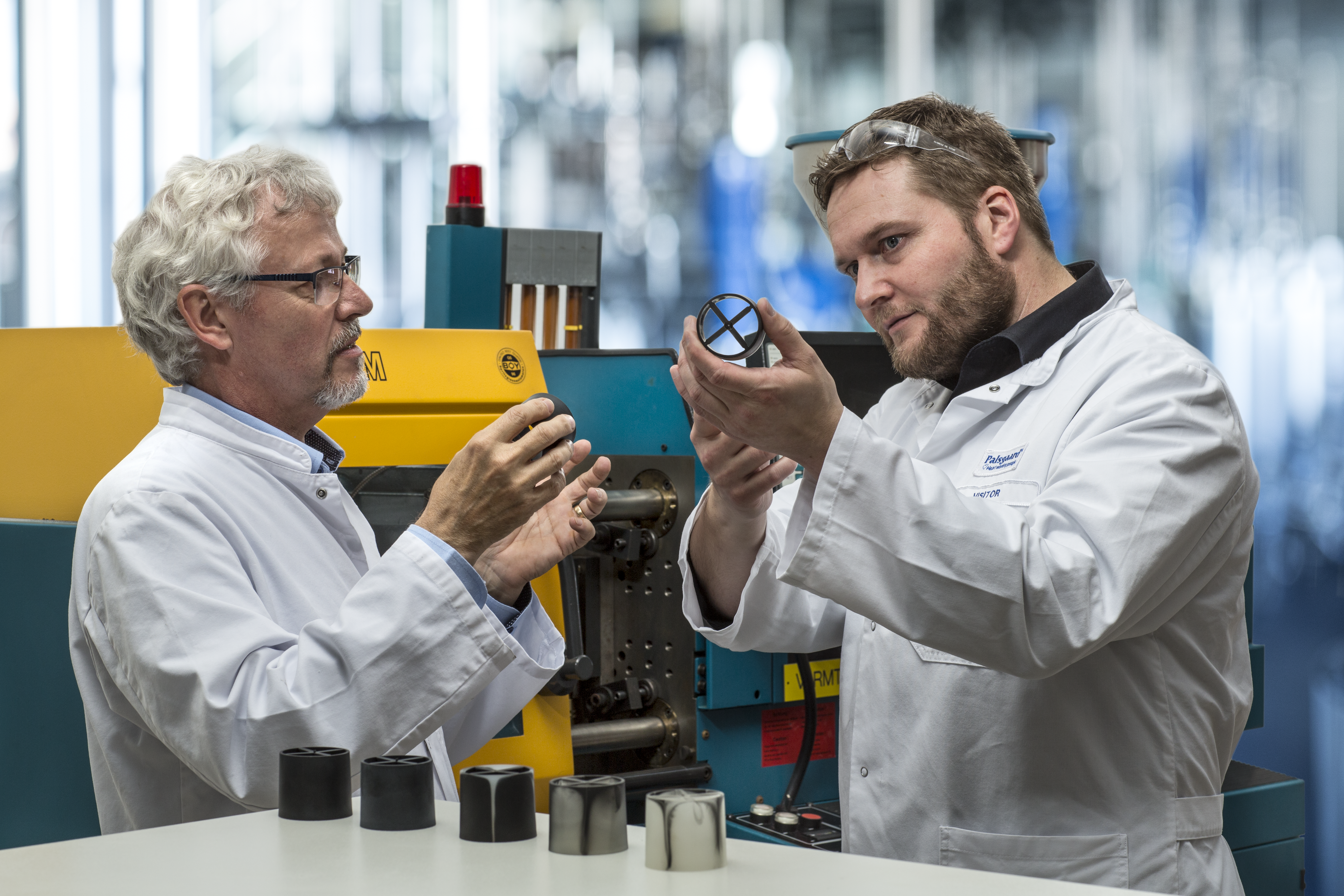 men looking at a chemical product