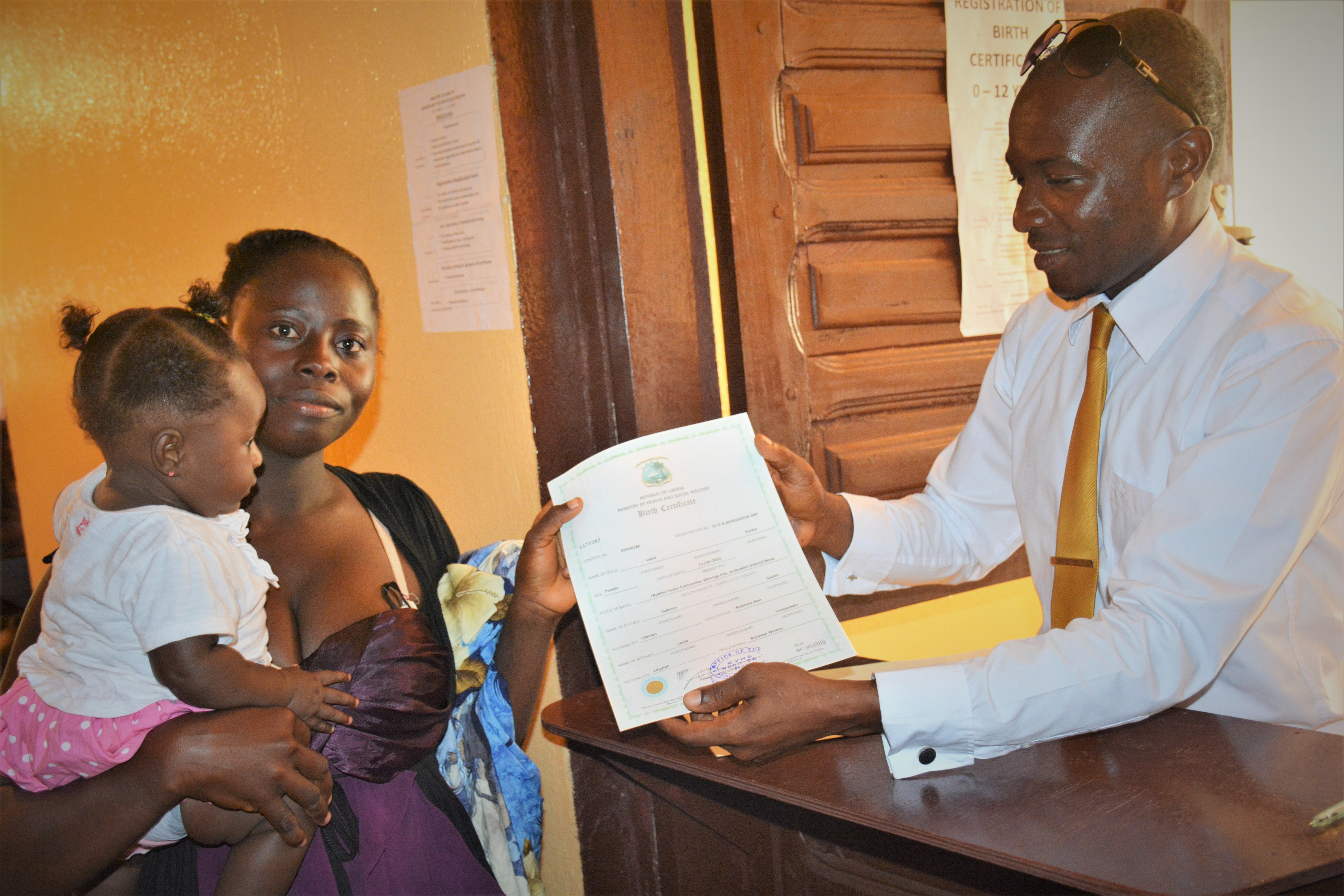 Young mother receives birth certificate