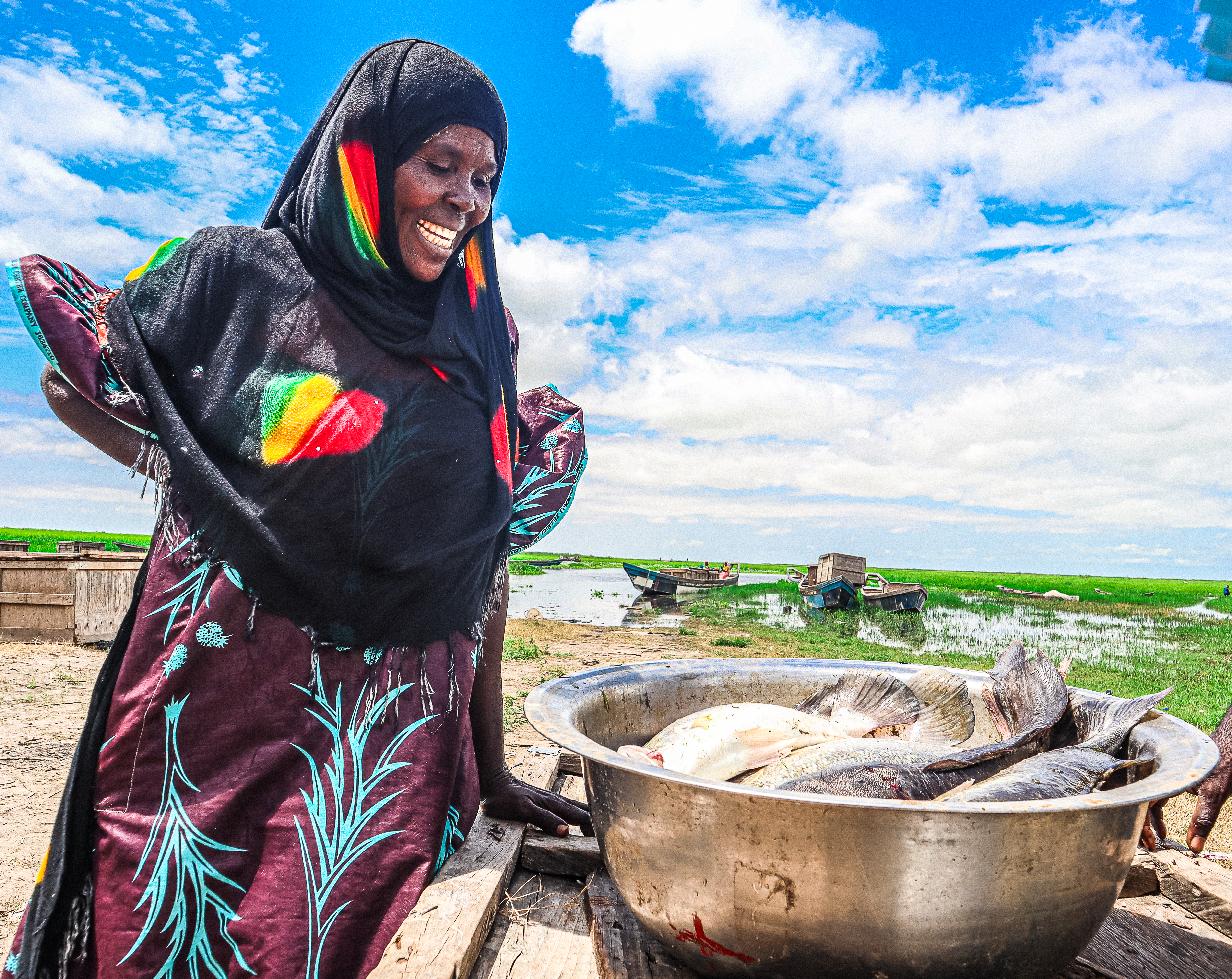 Zara Abdullahi smiling after a successful fishing escapade