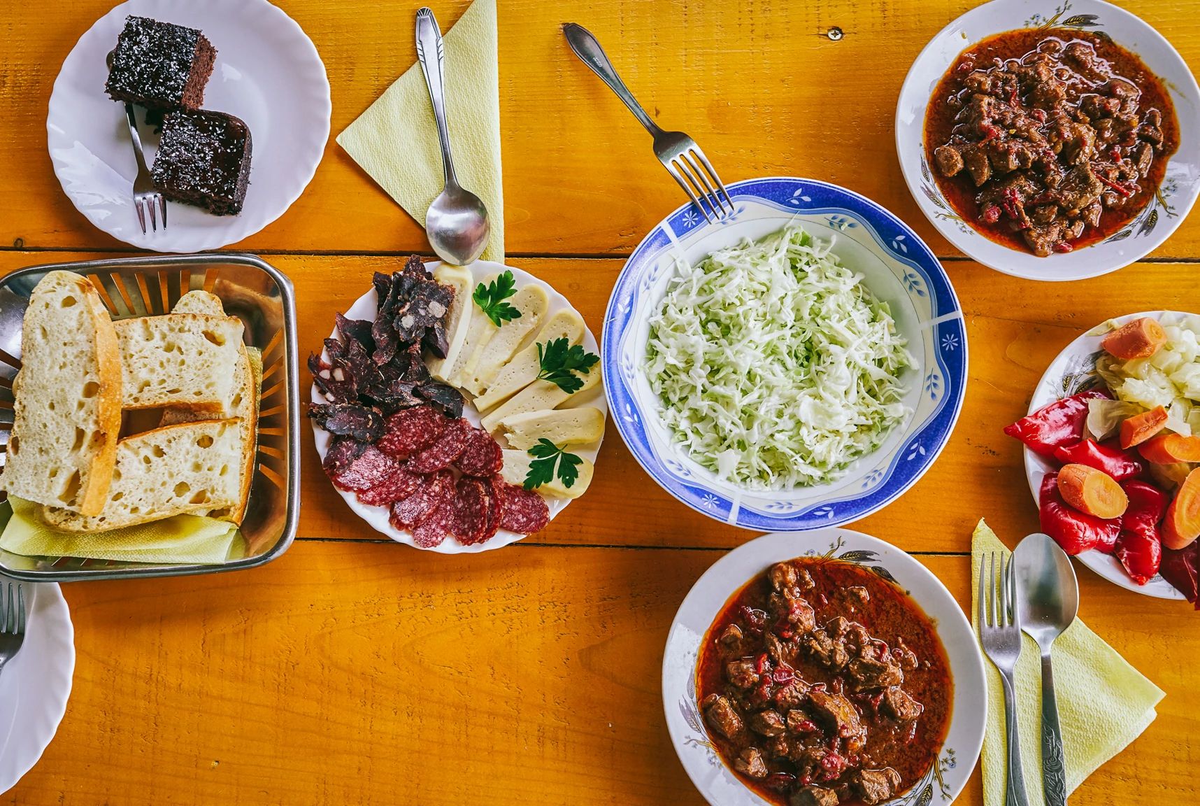 Overhead shot of several food dishes on a table.