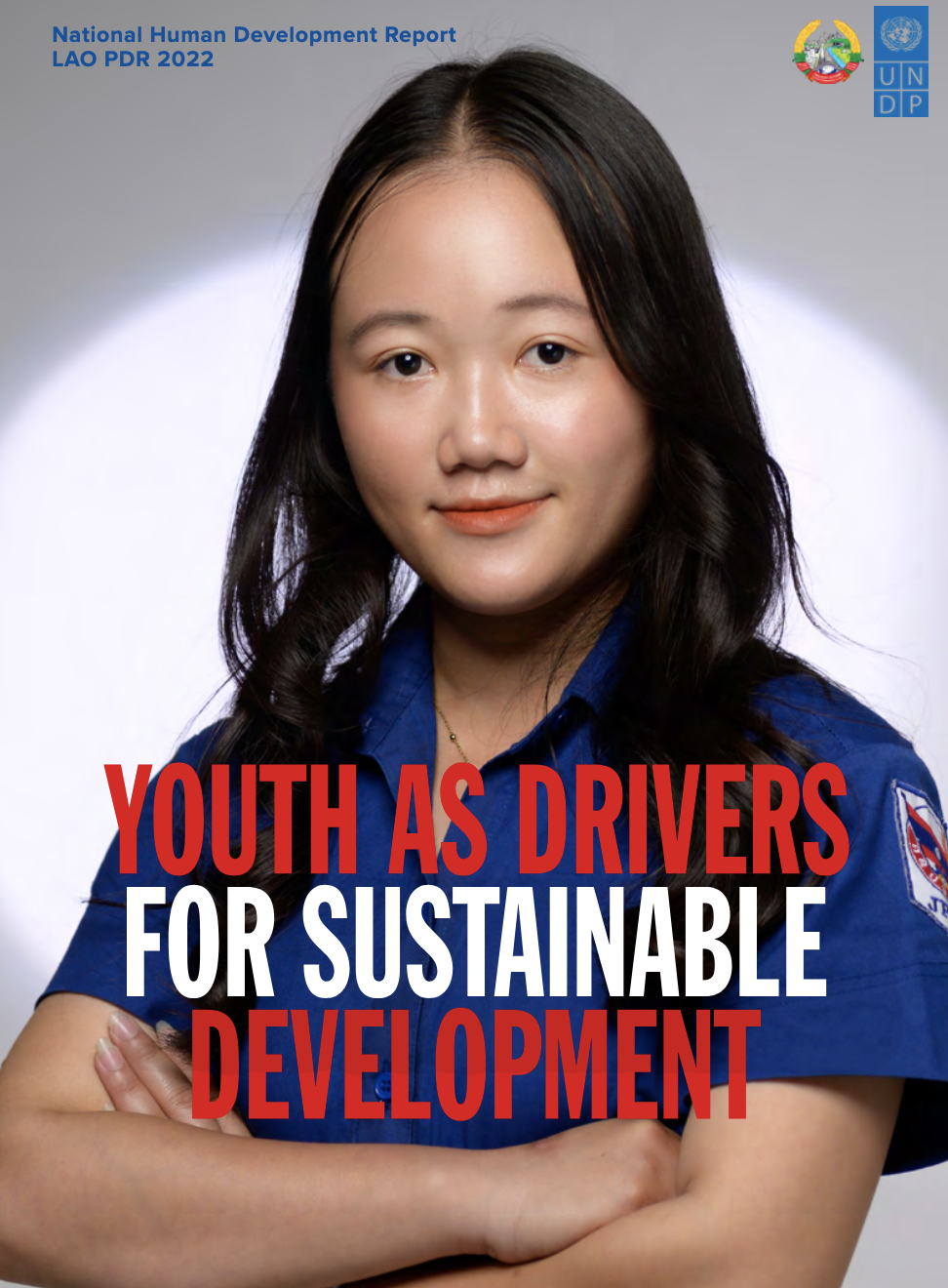 A young Lao woman on the cover page of the Lao 2022 national human development report