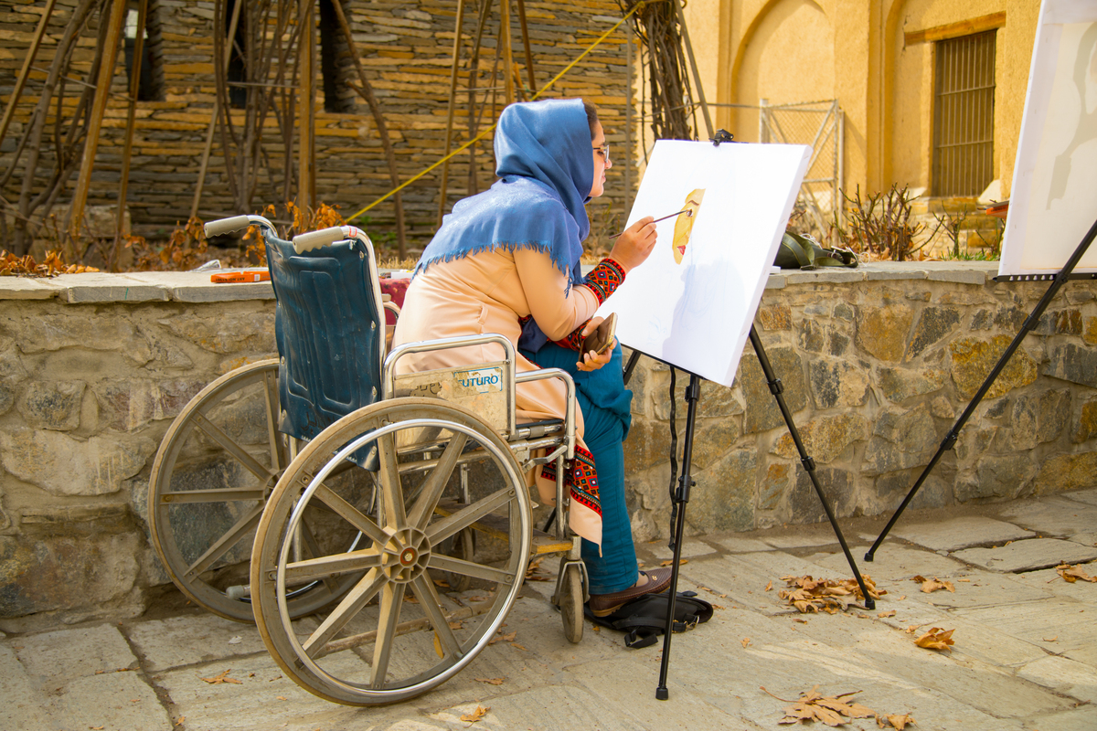 An artist in a wheelchair in Afghanistan