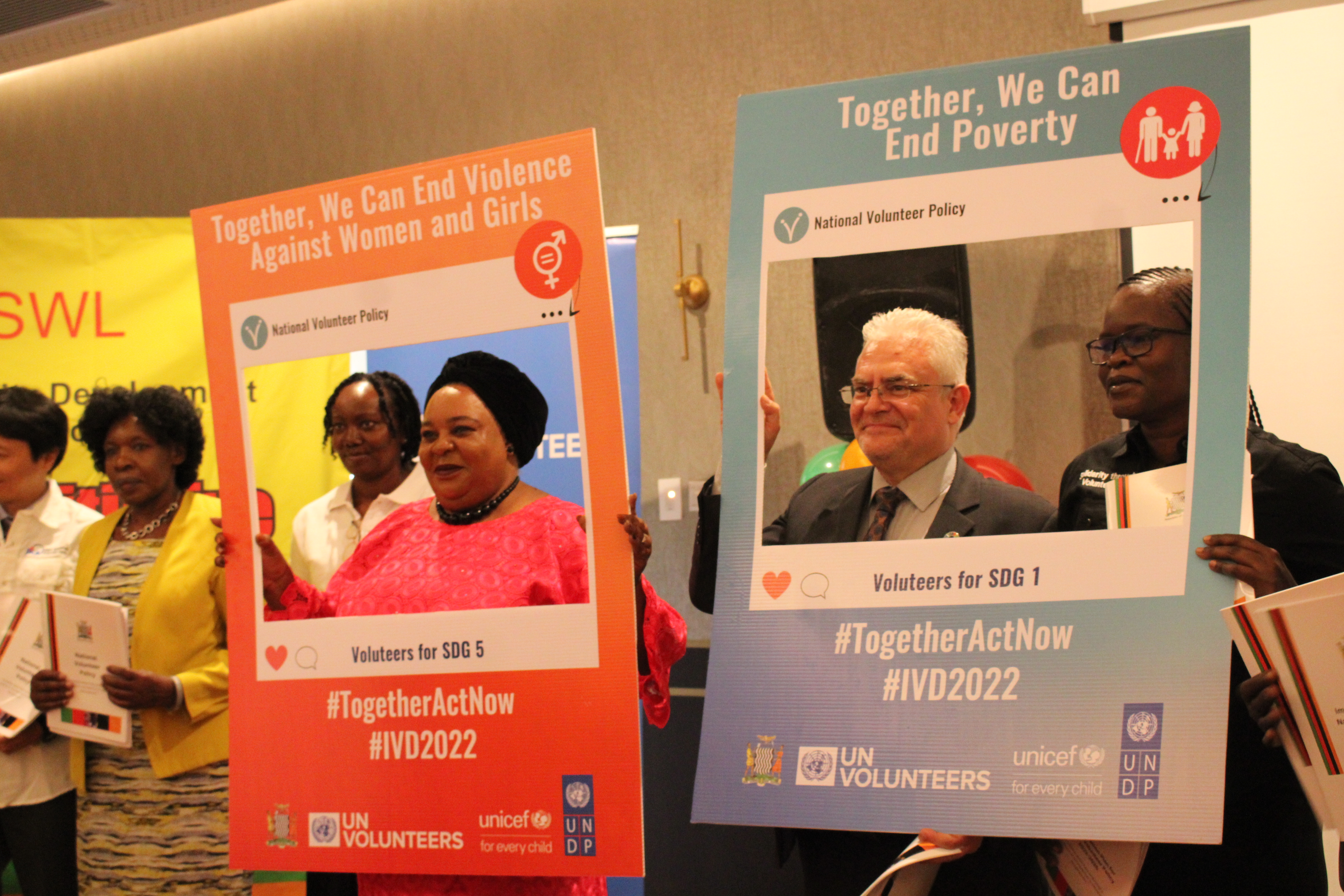 Zambia's Honourable Minister of Community Development and Social Services, Ms.  Doreen Sefuke Mwamba, MP and the UNDP Resident Representative, Lionel Laurens, and the UN Resident Coordinator, Beatrice Mutali, at the launch of Zambia's first National Volunteers Policy