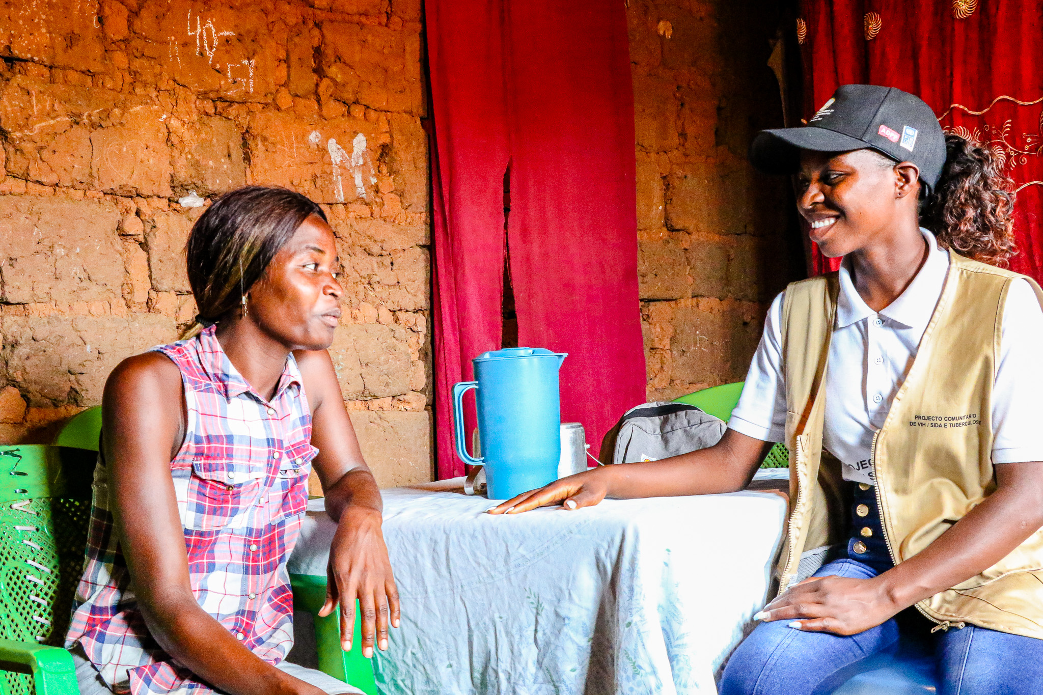 TB community health worker visiting a patient at home