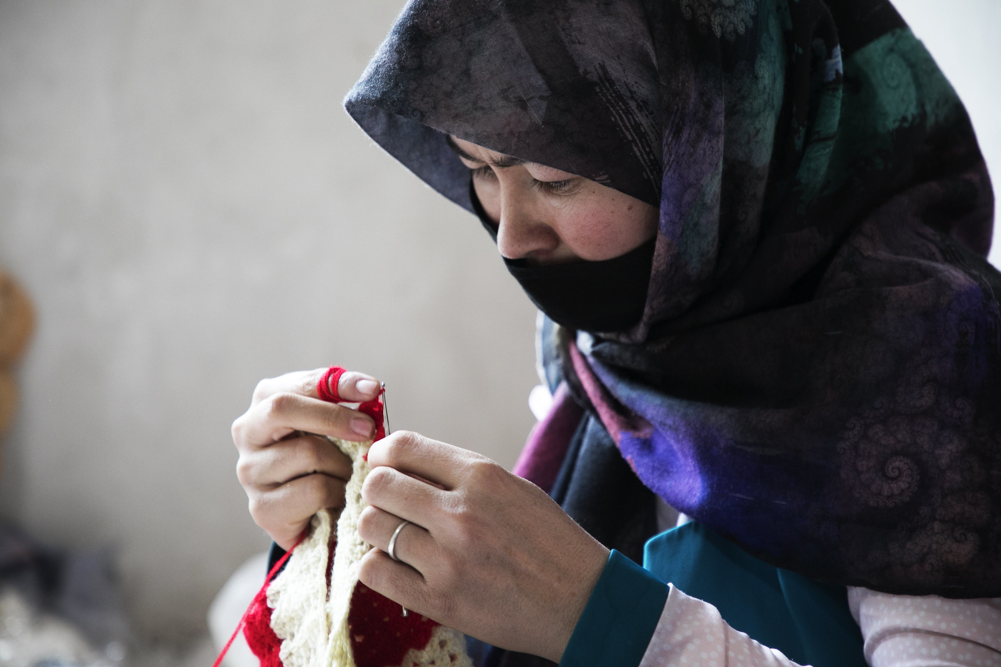 A women works at small tailoring business supported by UNDP in western Afghanistan. Credit: UNDP/Afghanistan
