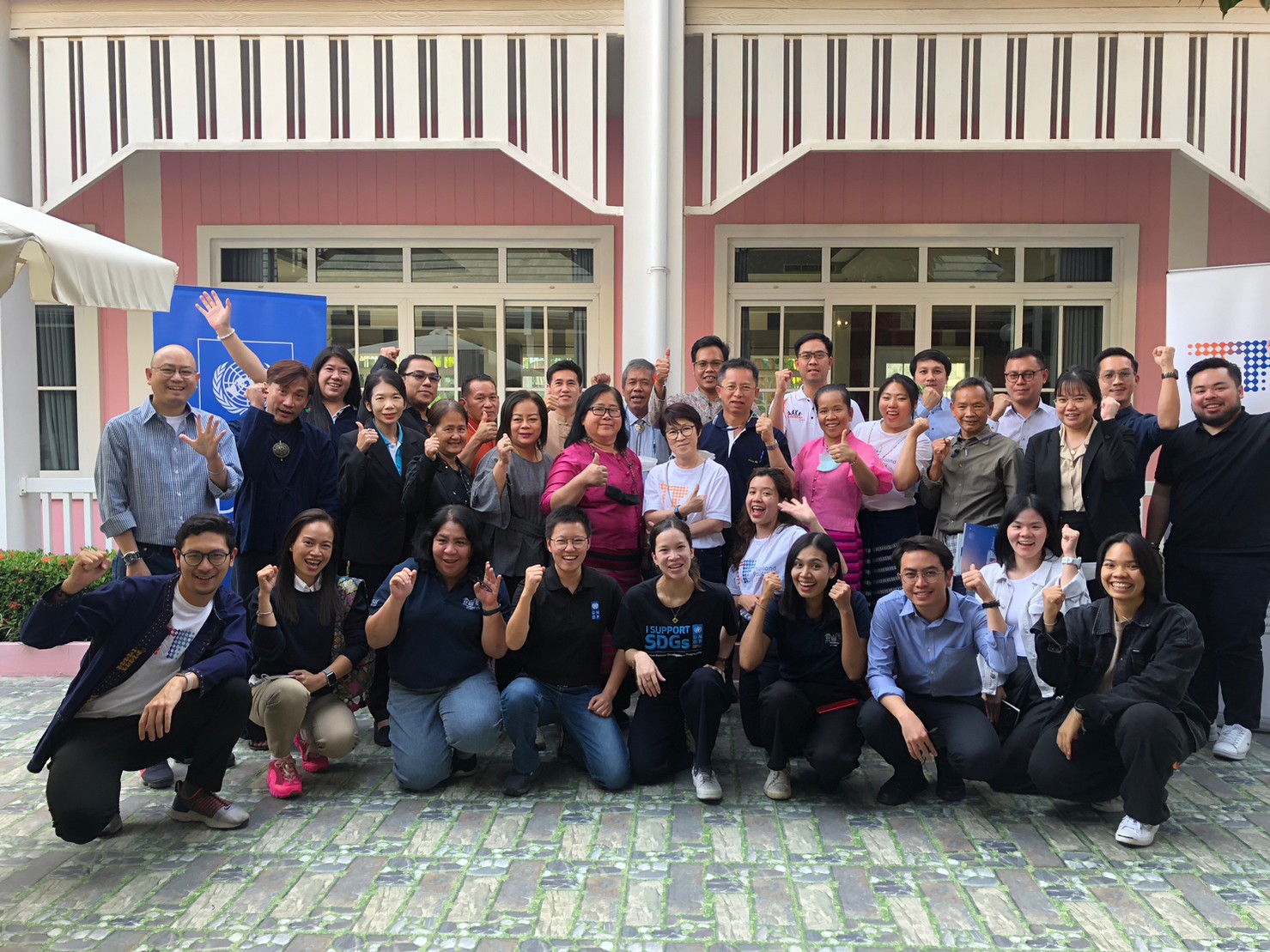 Napat Phumsiri (Mickey) with colleagues and participants  