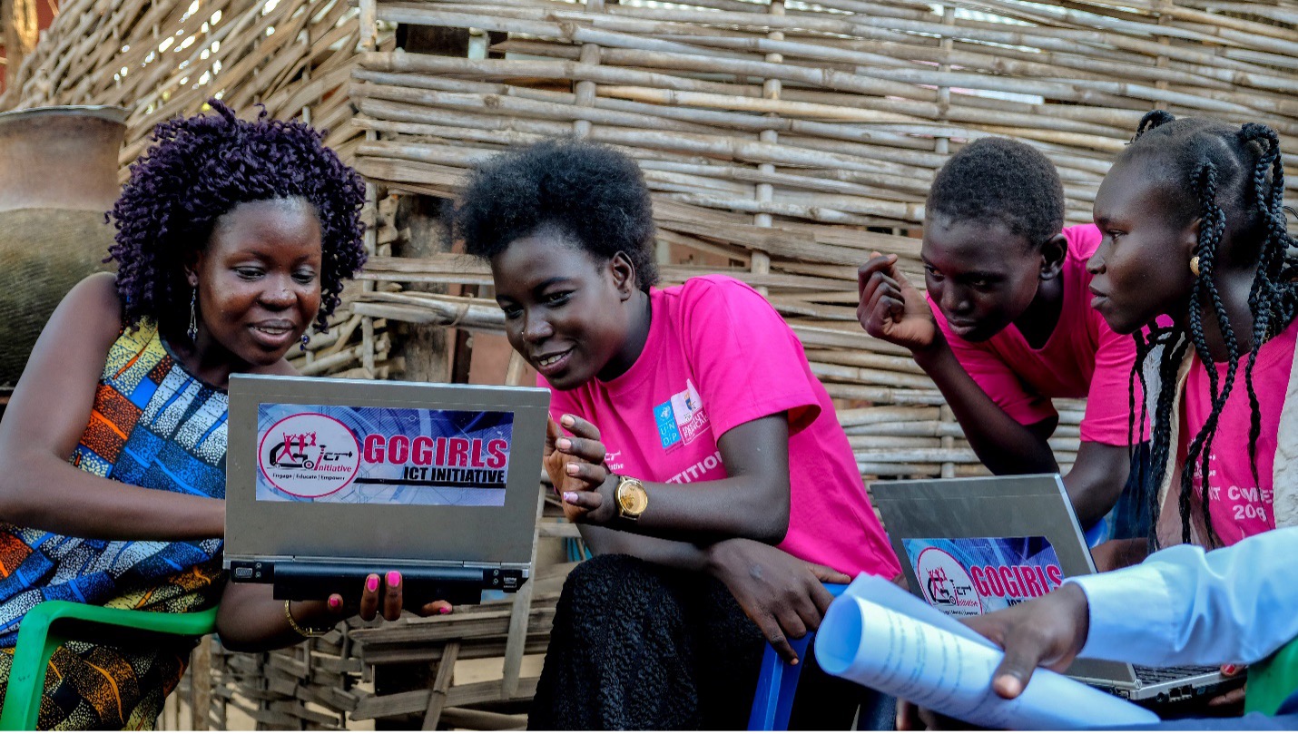 Girls in South Sudan work on their laptops