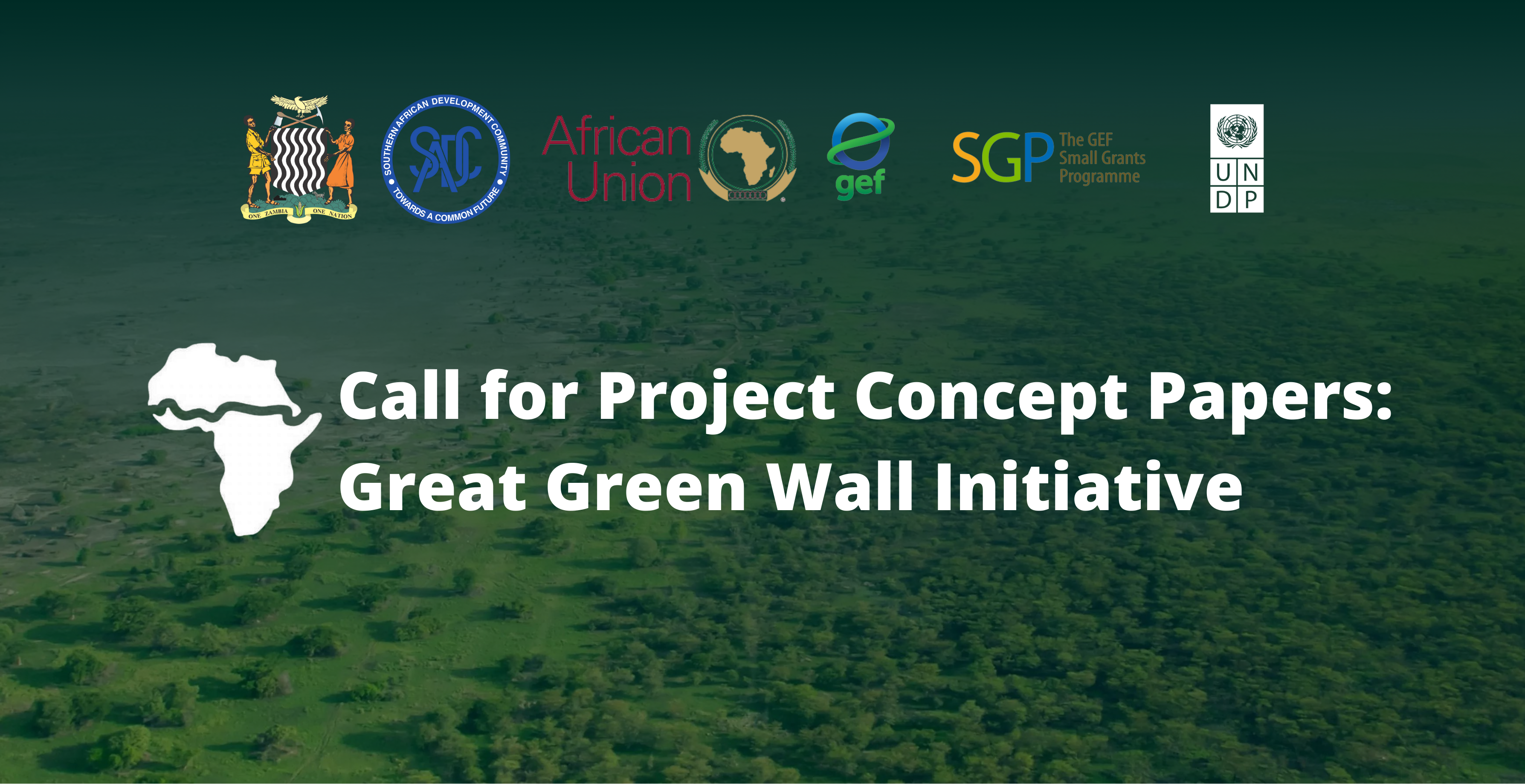 An image of an open field with text that reads "Call for Project Concept Papers: Great Green Wall Initiative 2023" and logos of the Government of Zambia, SADC, the African Union, the Global Environment Facility, the Small Grants Programme and the UNDP