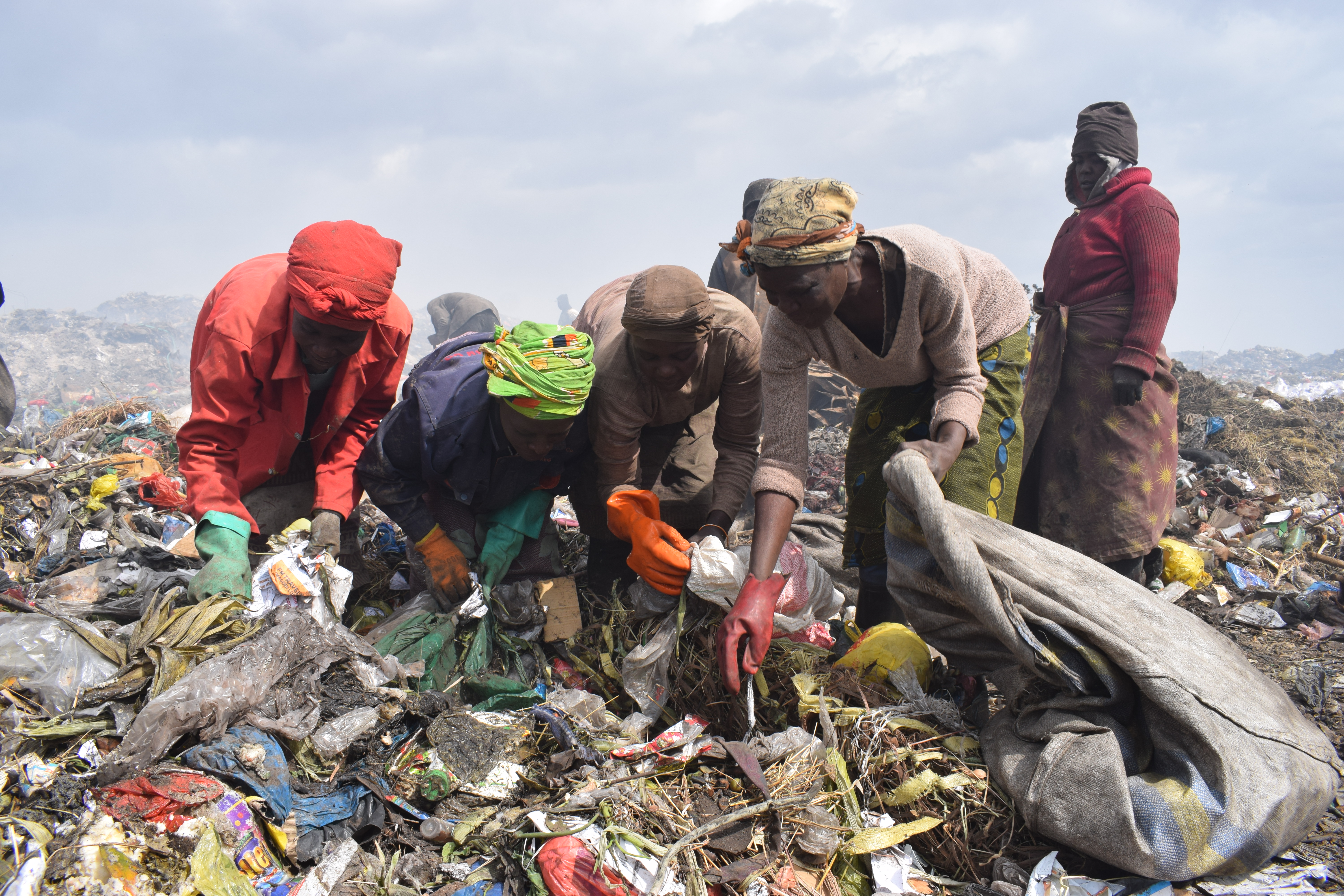 Wastepickers in Zambia sort through landfill