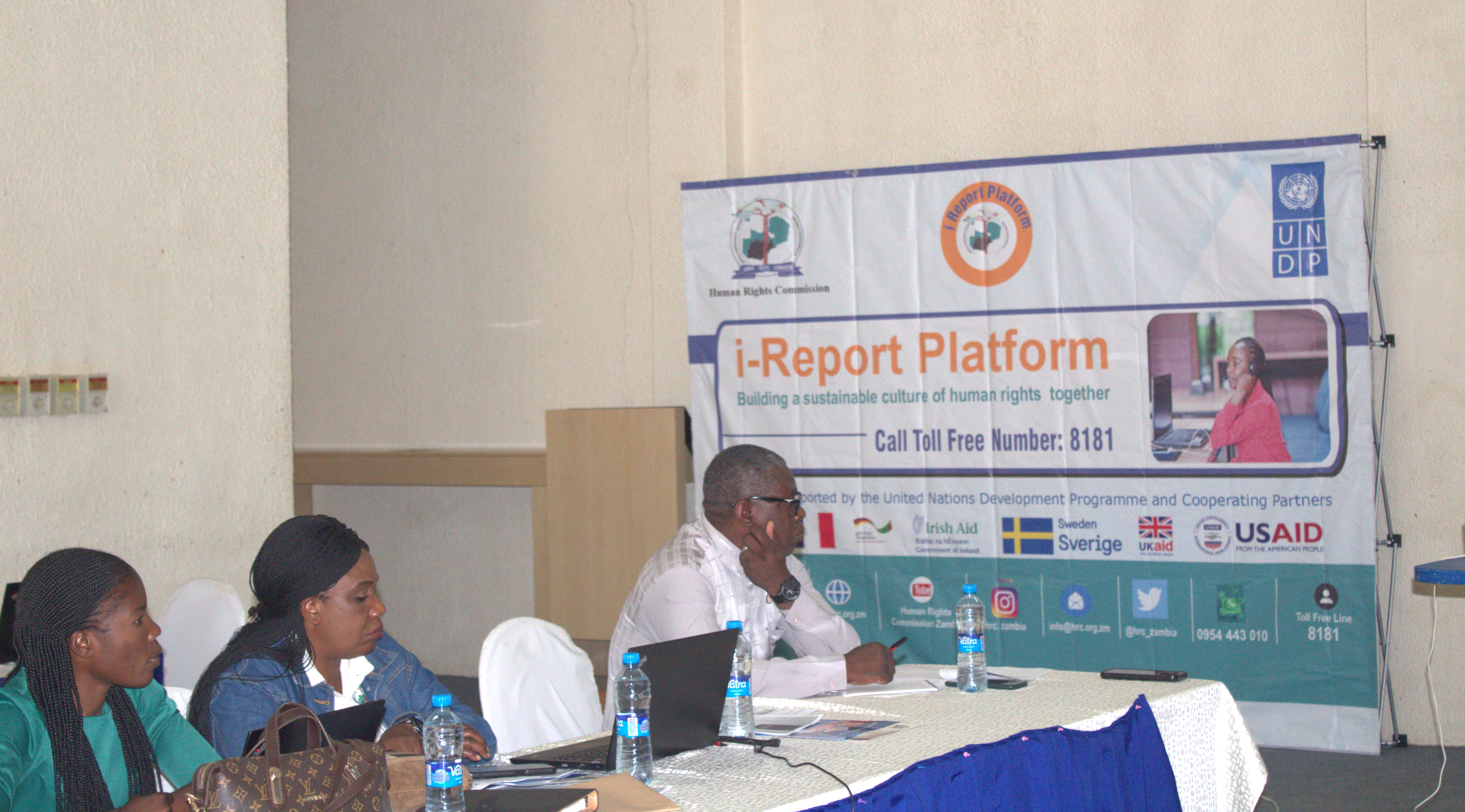 Images of participants at the i-Report Case Management System Trainer of Trainers workshop