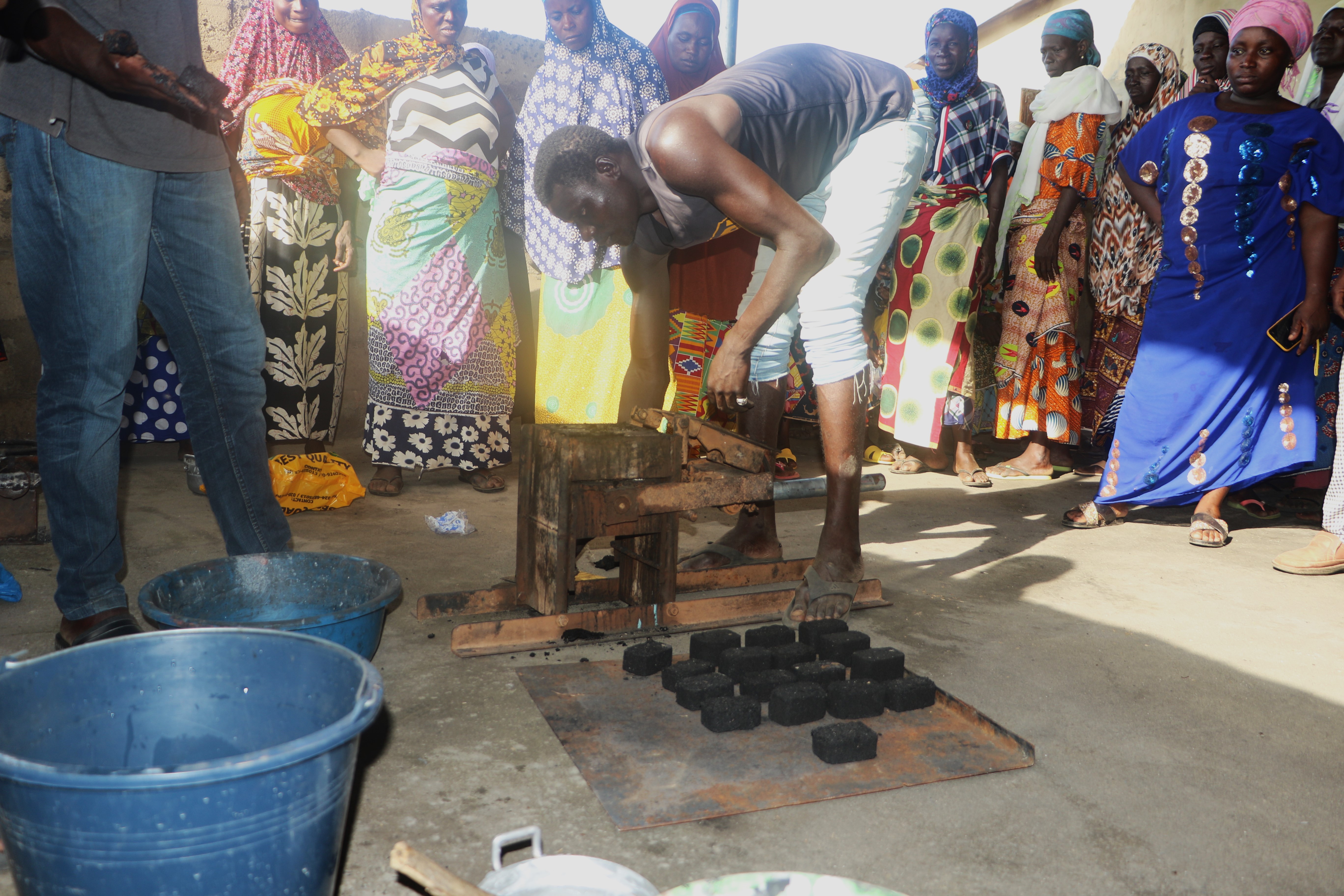 Man producing briquettes