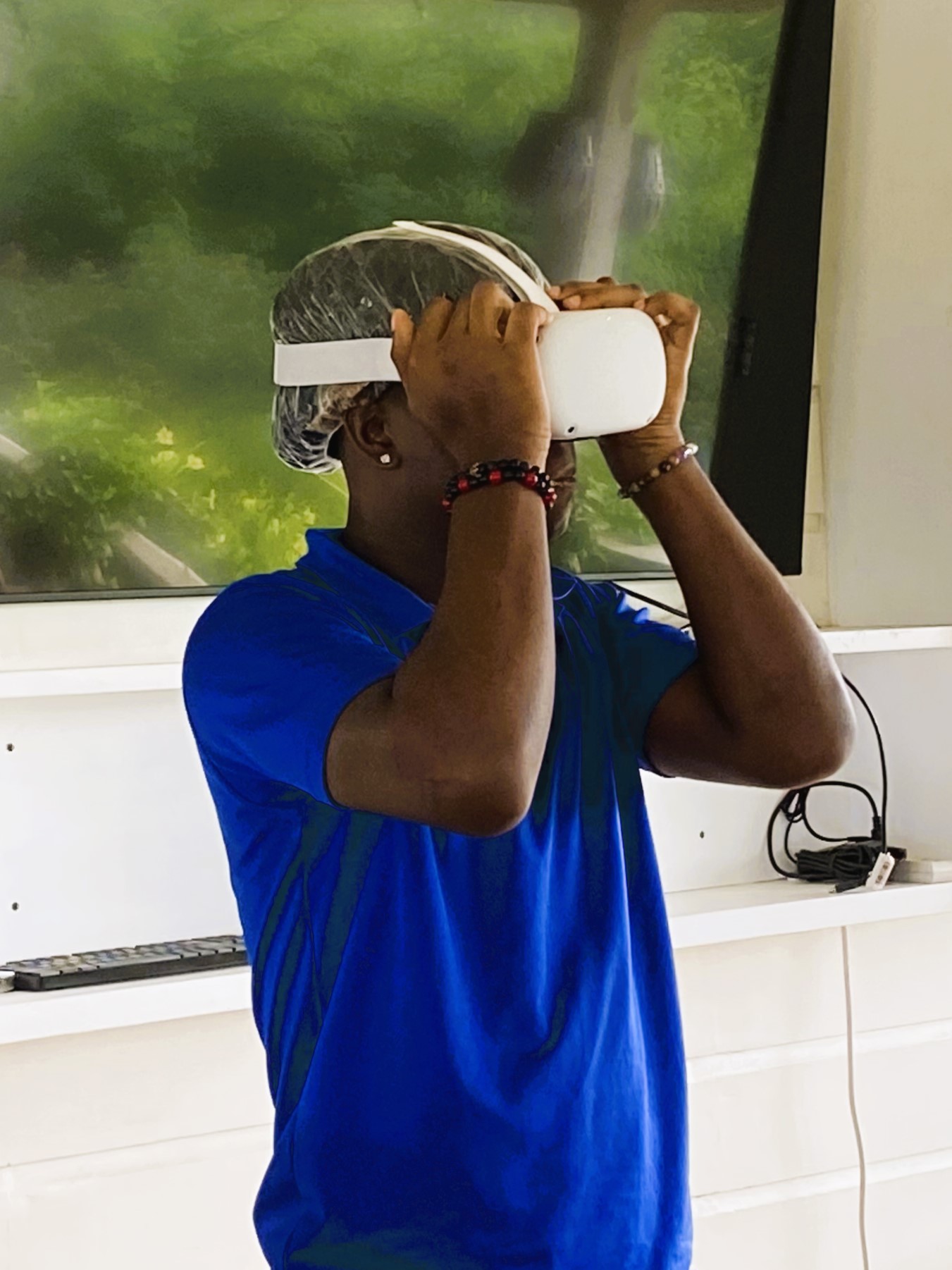 Young man with VR headset on head