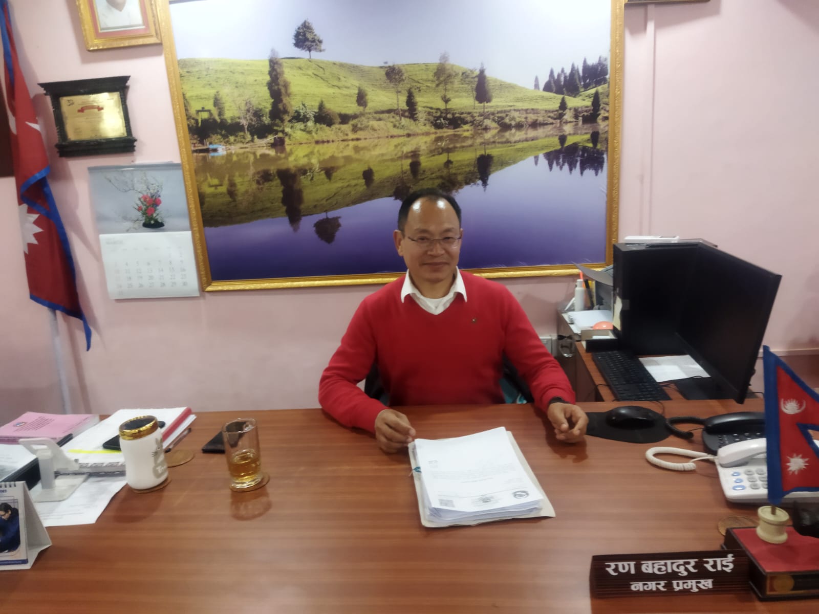 portrait photo of mayor Rai sitting in his office