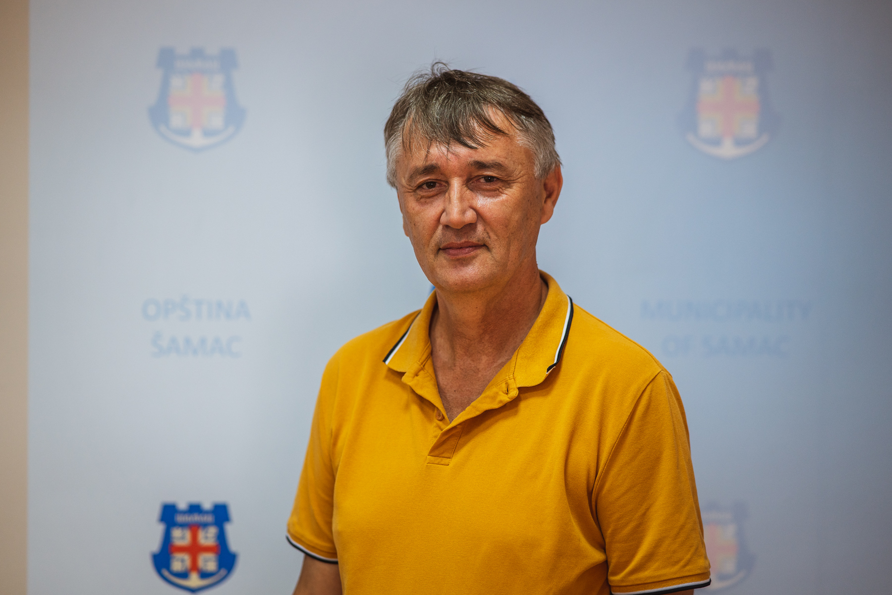 a person standing posing for the camera