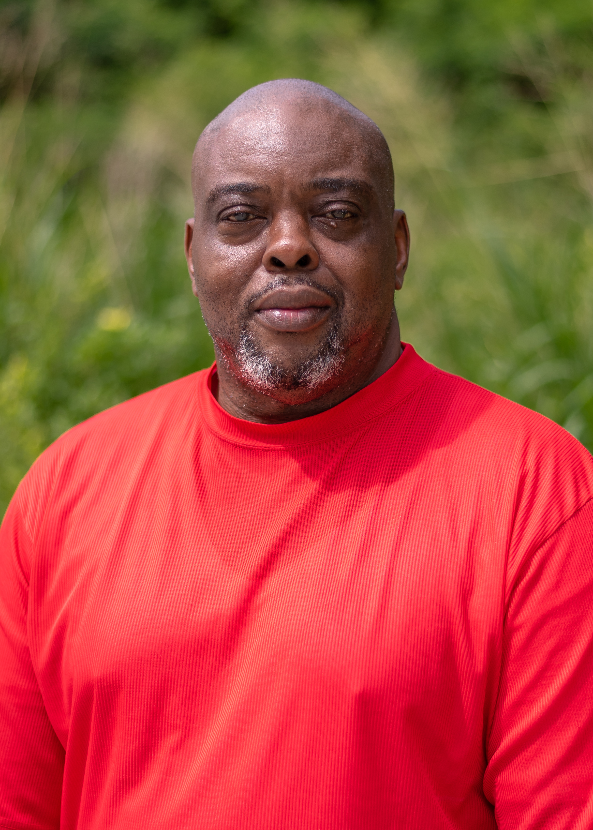 portrait of a man in red shirt 