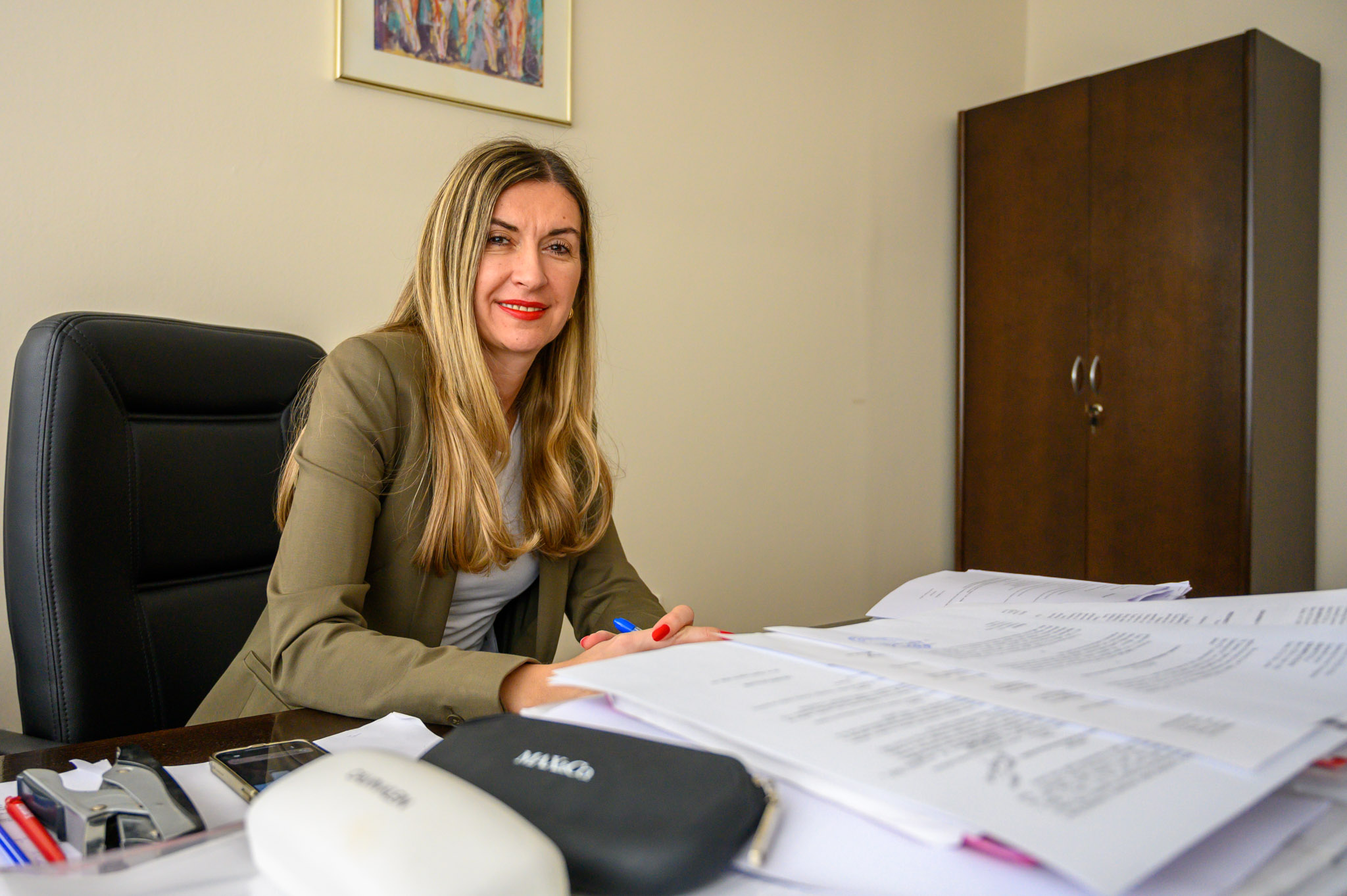 a woman sitting at a desk