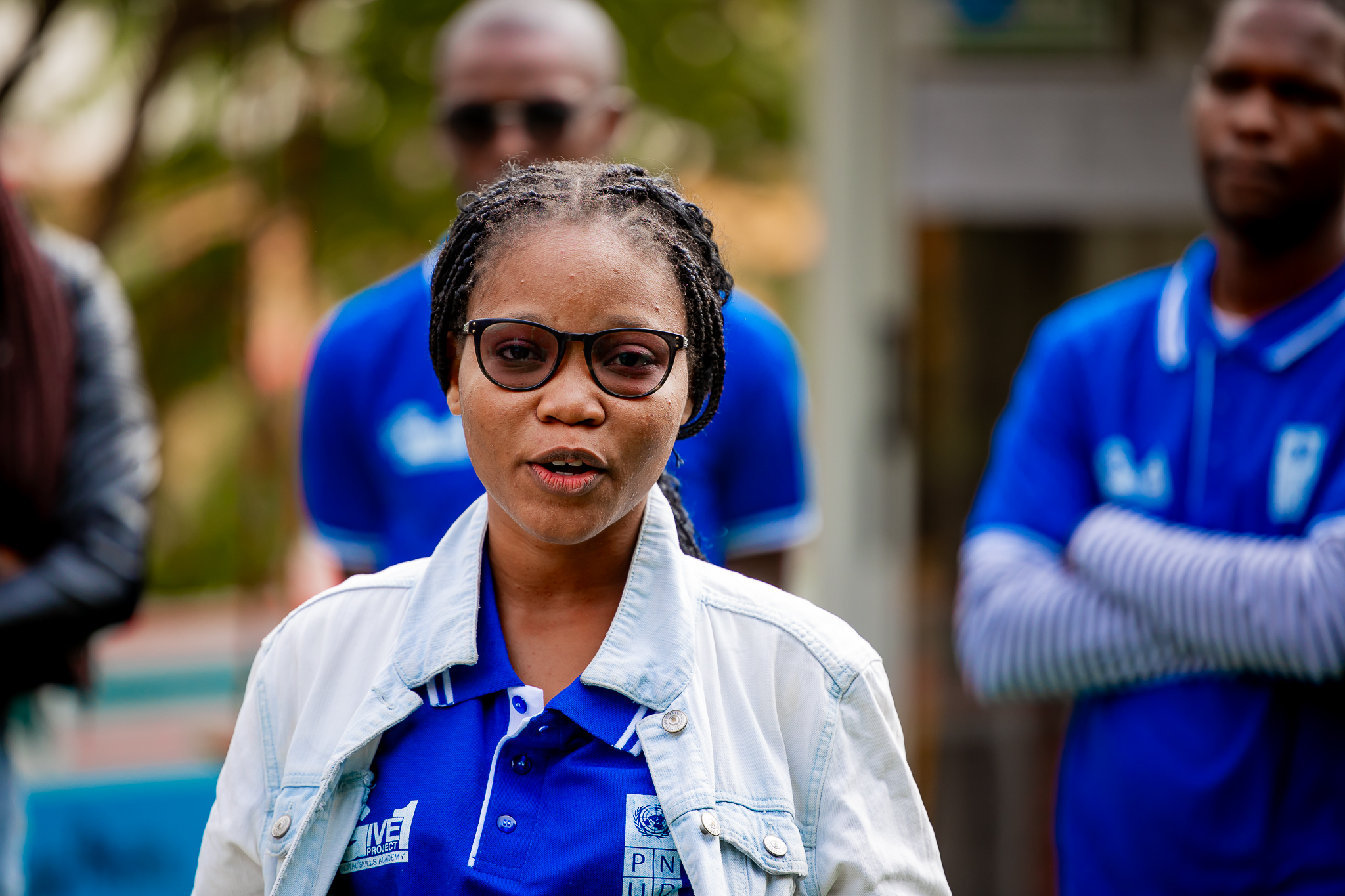 a woman in a blue shirt