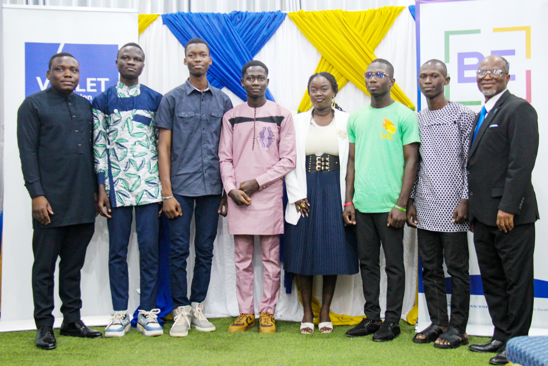 a group of people posing for a photo