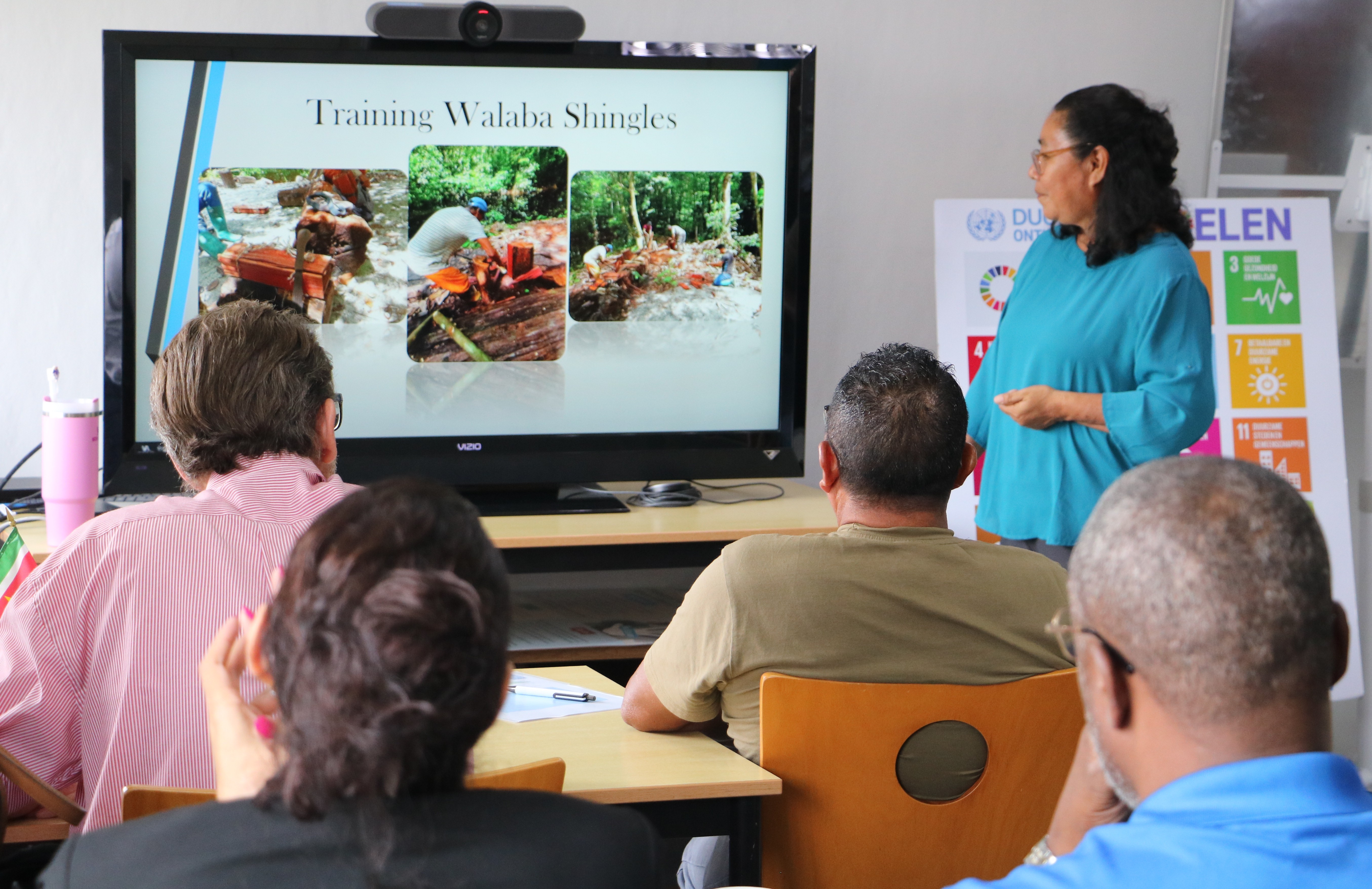 Mrs. W. Sabajo, assistant at Cooperative Borodong Matta G.A. presenting their achievements