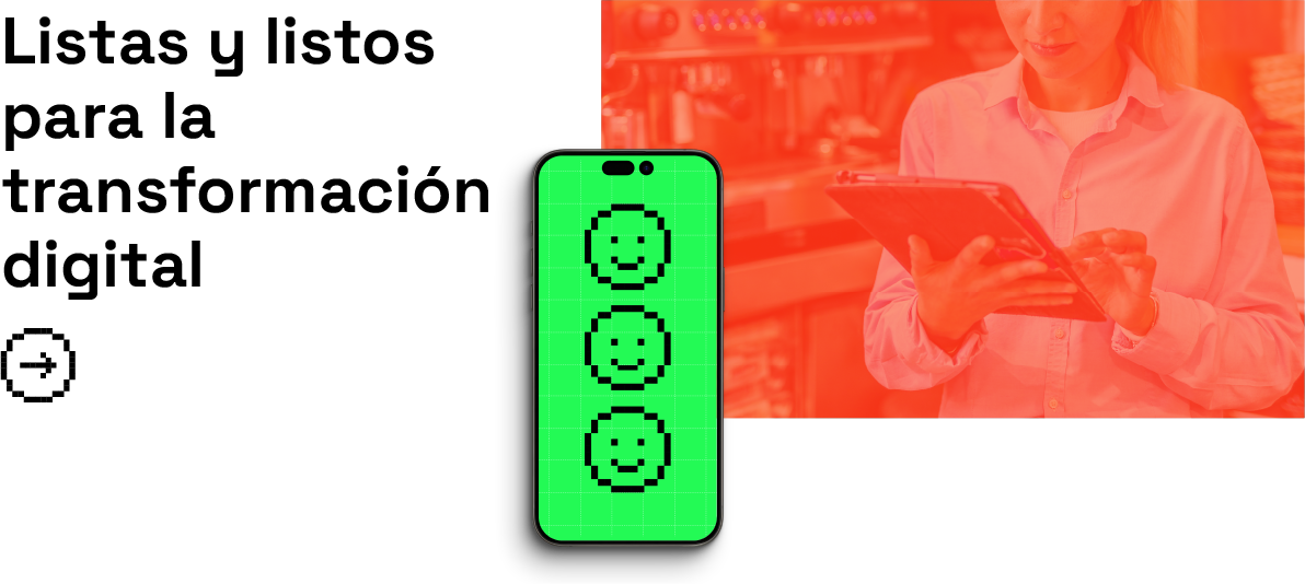 A green phone displaying three smiley faces next to a woman using a tablet in a store.