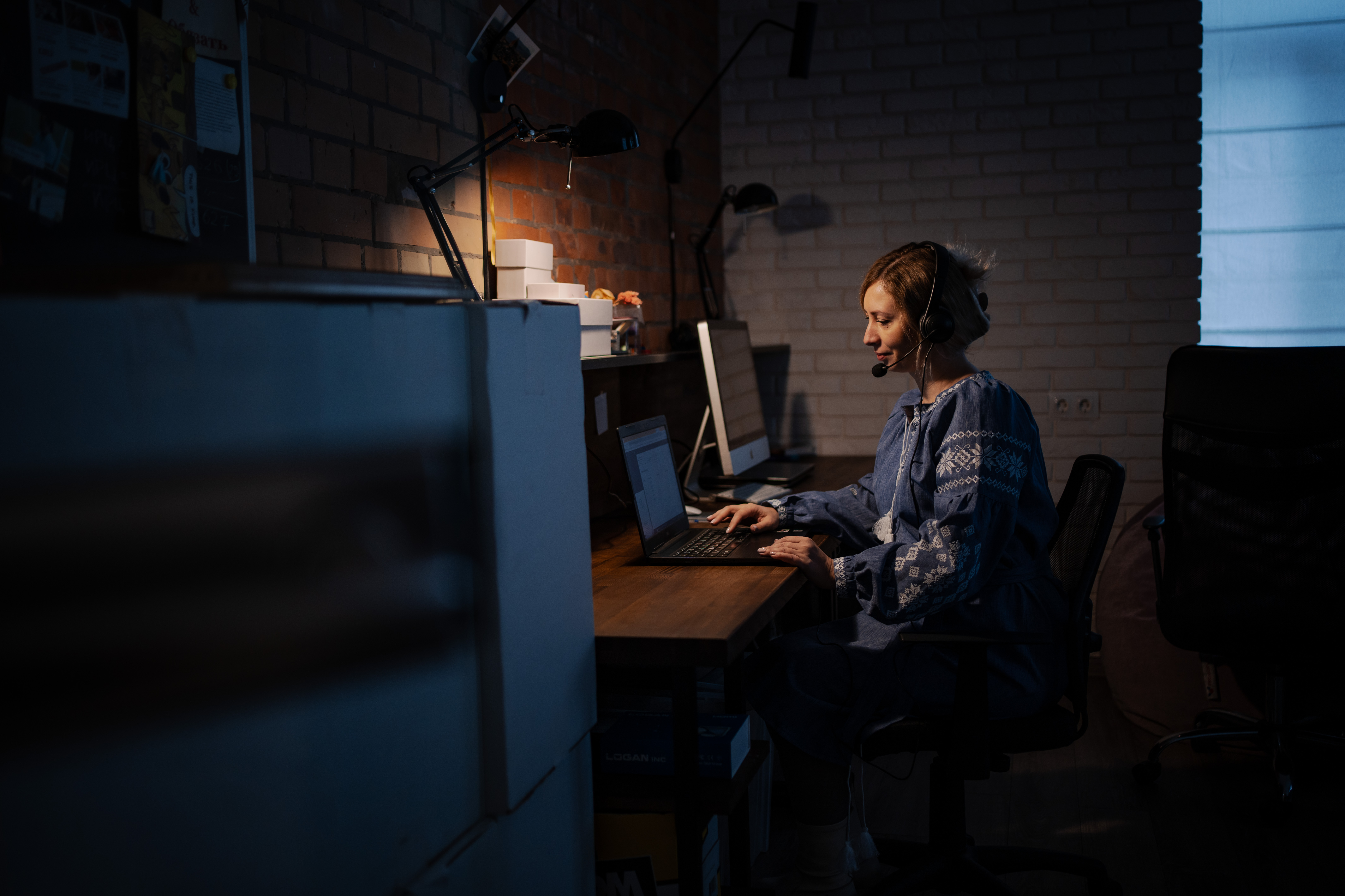 Woman sits at keyboard