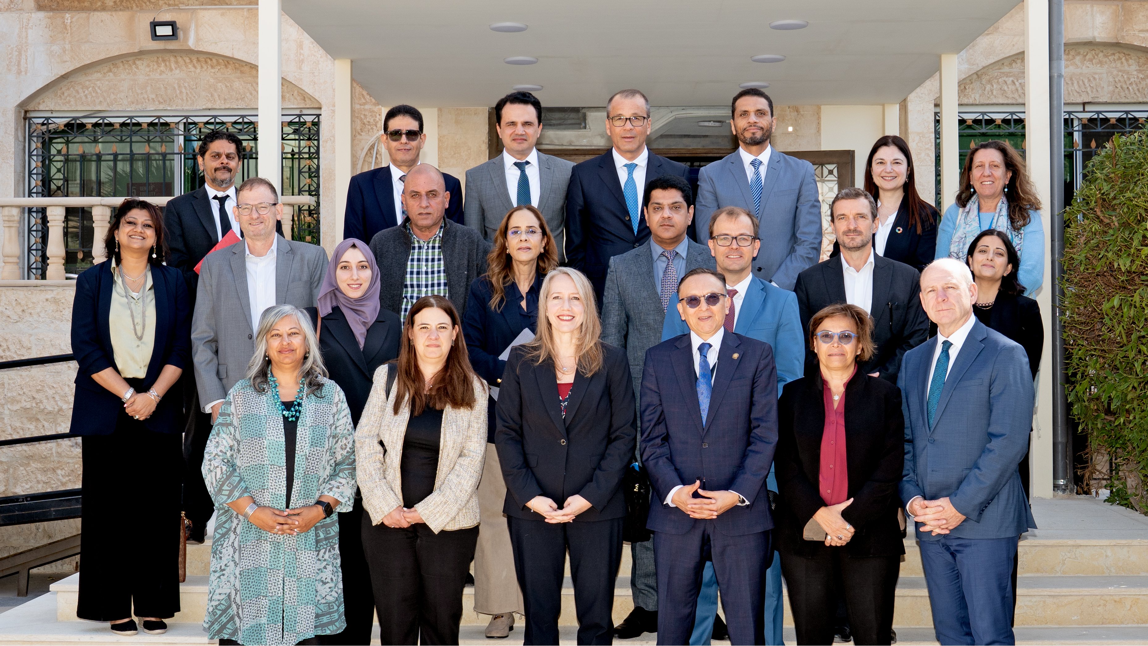 A delegation of ambassadors from the Executive Board participate in a group photo session to mark the conclusion of their field visit to Jordan. 