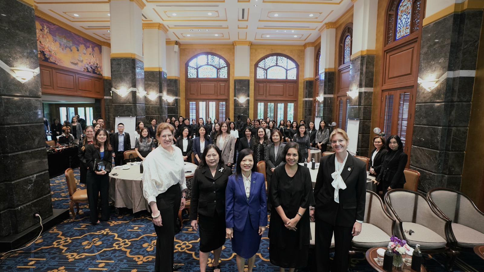 Group of women judges people posing for a photo at the Thai Women Judges Colloquium.