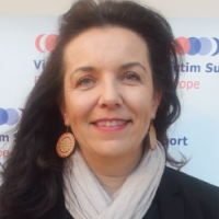 a woman smiling for the camera