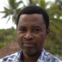 a man smiling for the camera