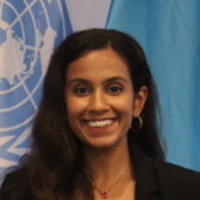 a woman smiling for the camera