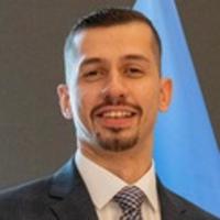 a man wearing a suit and tie