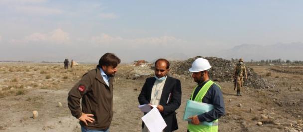 Adnan Safi with colleagues at a flood protection wall site in Behsud District, Jalalabad.