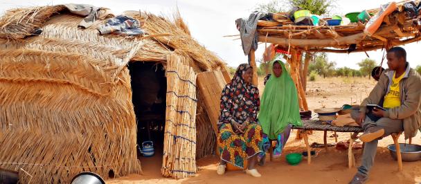 Borderland residents speak with a researcher in Tillabery, Niger