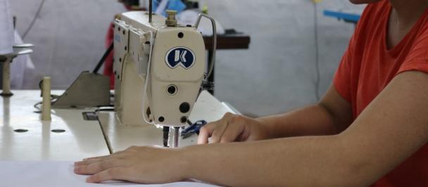 Woman working with a sewing machine