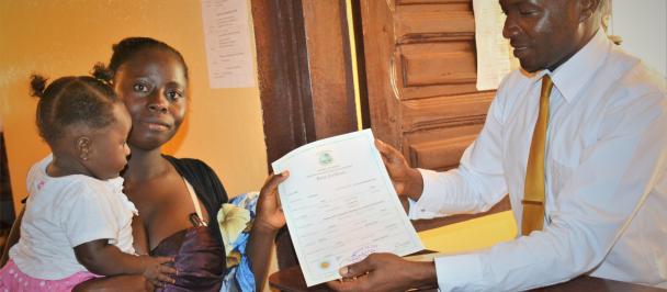 Young mother receives birth certificate