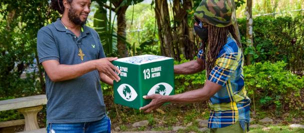 Duane Stephenson and Ras Rebellion with SDG 13 box