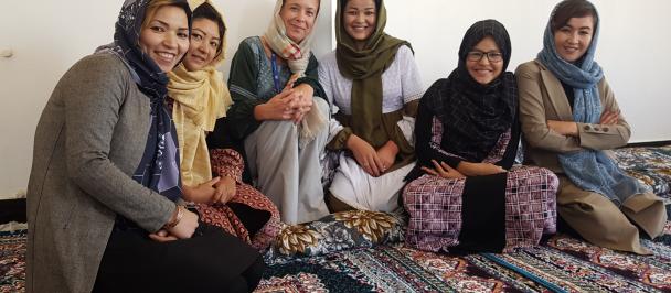 UNDP Afghanistan Regional Manager of Bamyan, Pamela shares a special moment with Islamic Relief's Community Mobilizers.