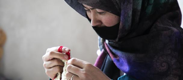 A women works at small tailoring business supported by UNDP in western Afghanistan. Credit: UNDP/Afghanistan