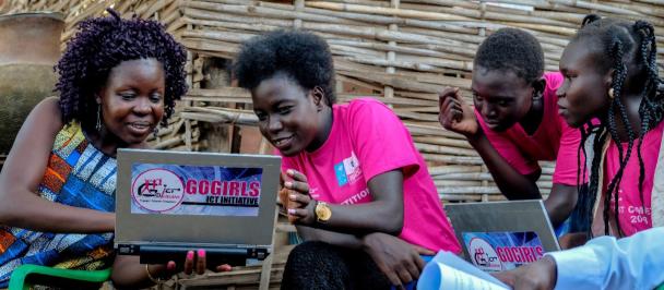 Girls in South Sudan work on their laptops