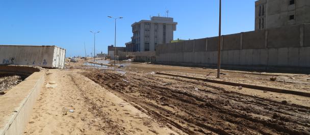 Muddy road in the aftermath of flooding in Libya