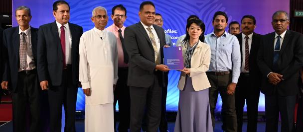 Official Handover of the Distrcit Profiles by Ms Azusa Kubota to Hon Minister Shehan Semasinghe