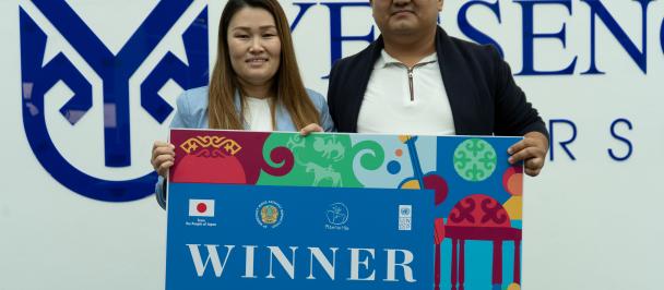 a person holding a sign