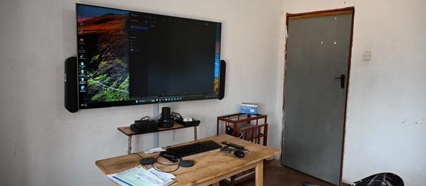 a television is sitting on a desk