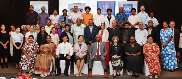 a group of people posing for a photo
