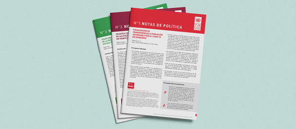 Three magazines with colored headers fanned open on a pale teal background.