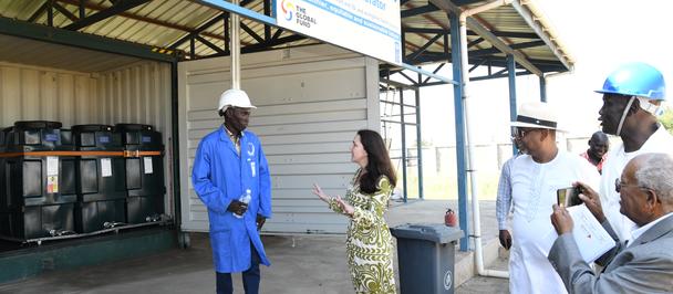 Ambassador Joanne Minns, Dr. Mohamed Abchir, and other officials visited a medical incinerator at Riverside Warehouse in Gumbo.