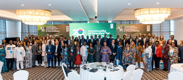 Group photo of the participants of the CoP in the meeting room 